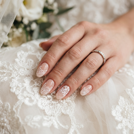 Nails with white lace patterns