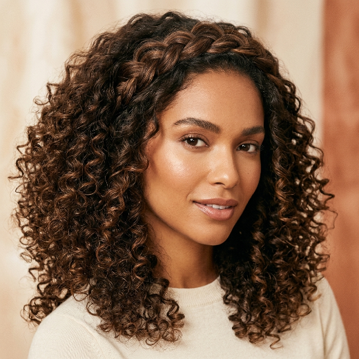 Curly hairstyle with braid details