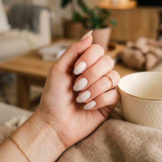 Milky white nails silver glitter