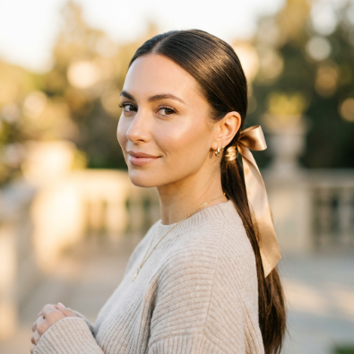 low twisted ponytail with ribbon
